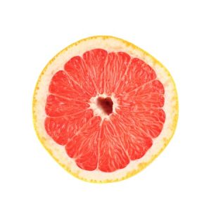 Single ripe fresh grapefruit cut in half